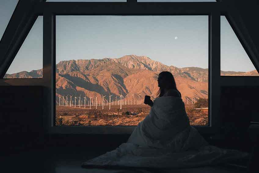 A woman enjoying her AirBnB trip.