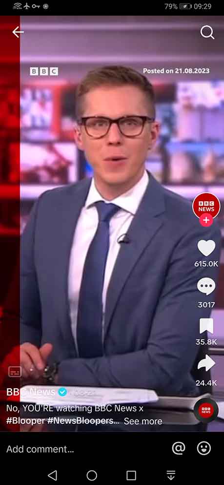 A news anchor from the BBC introducing the news of the day